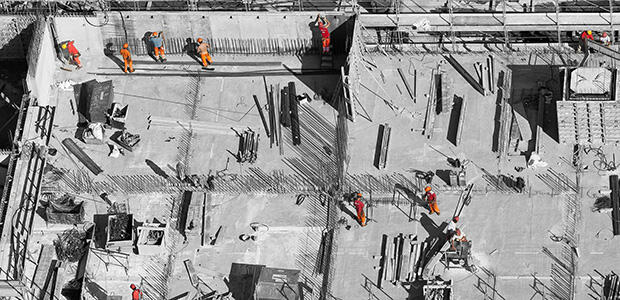 Men constructing a building. Image: Ricardo Gomez Angel / Unsplash
