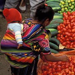 Buying food at the market. © Curt Carnemark / World Bank