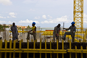 Construction workers on site. © Arne Hoel / World Bank